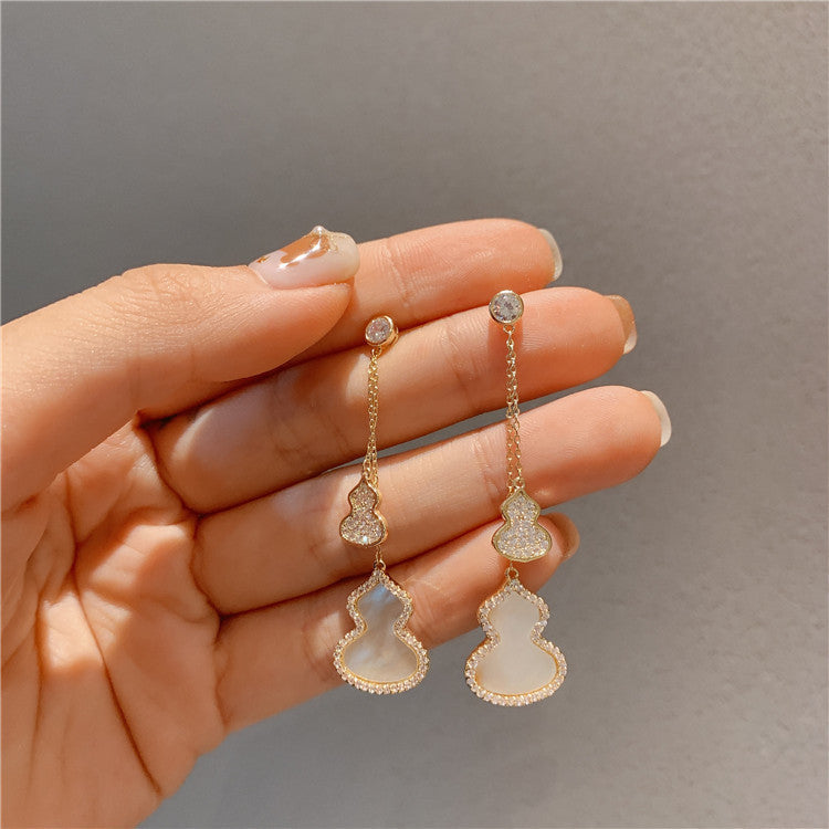 Boucles d’oreilles en forme de calebasse